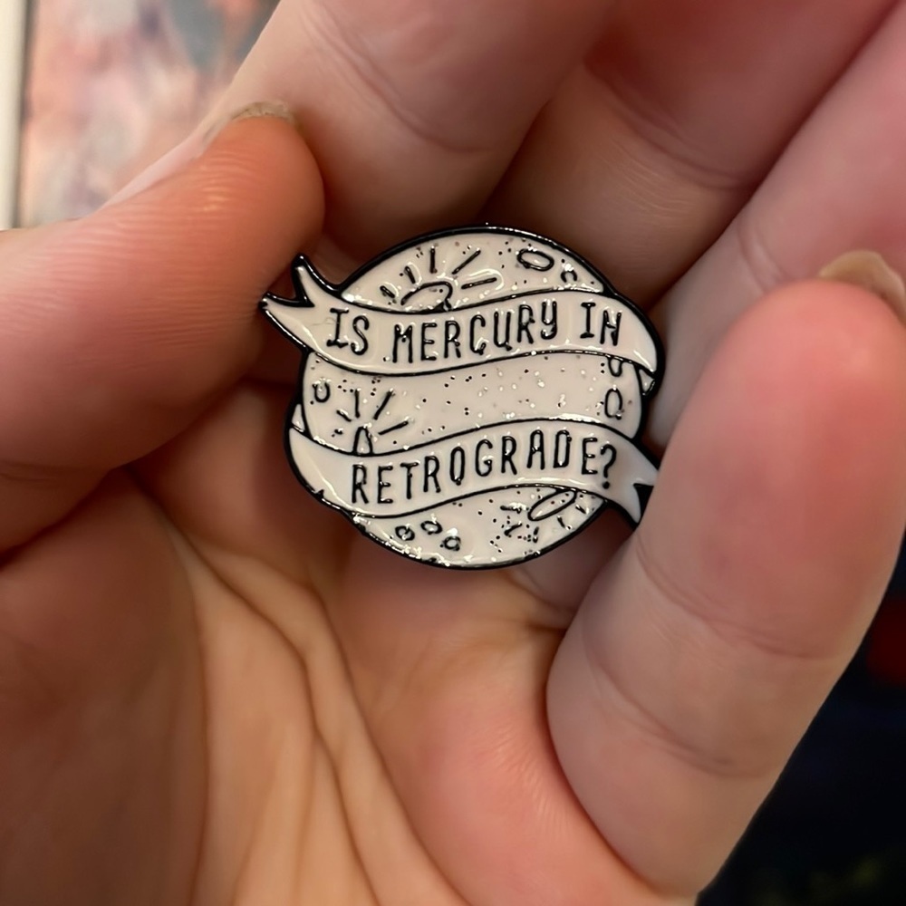 URBAN OUTFITTERS Mercury in Retrograde feminist Astrology pin brooch